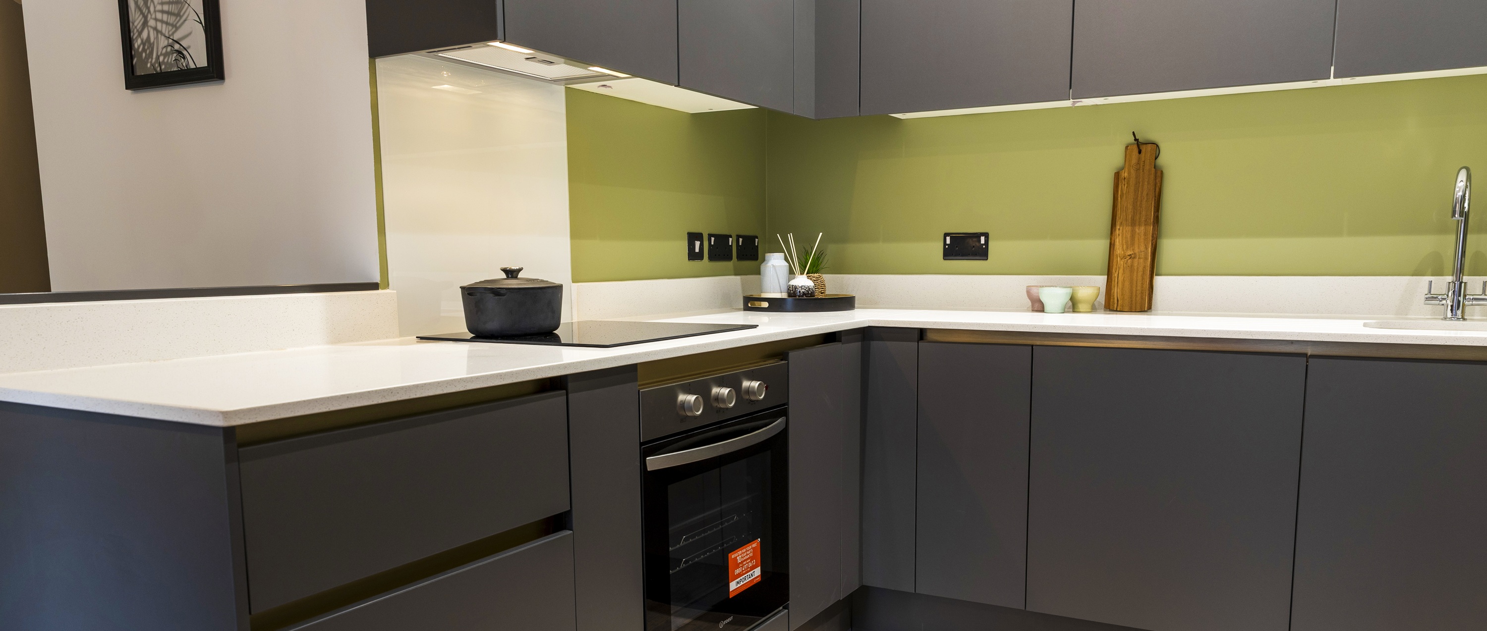 A photograph showing the integrated applicances in the open plan kitchen.